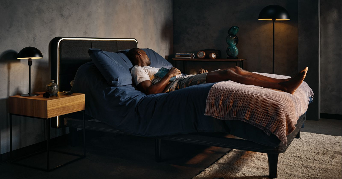 Man sleeping with head elevated in ErgoSportive smart bed